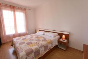 Posteľ alebo postele v izbe v ubytovaní Apartments Brico