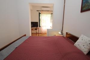 Łóżko lub łóżka w pokoju w obiekcie Apartments Saša - pets friendly!