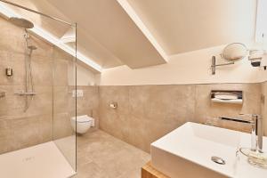 Vannituba majutusasutuses Hotel Garni Sursilva