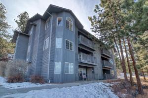 a large apartment building with snow on the ground at Quiet in the Pines - Permit #3120 in Estes Park