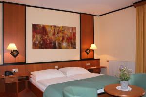 Posteľ alebo postele v izbe v ubytovaní Landgasthof Hotel Muhr