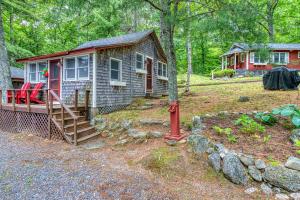 a small house in the middle of a forest at Toddy Pond Jack in Orland