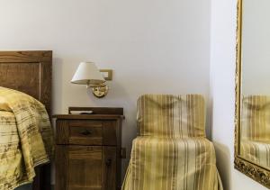 Postel nebo postele na pokoji v ubytování Hotel Baia