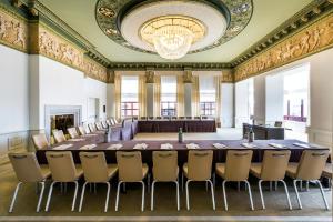 a large conference room with a large table and chairs at Savoia Excelsior Palace Trieste - Starhotels Collezione in Trieste