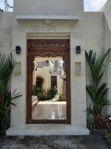 Eine Fassade oder ein Eingang zu The Satya Villa