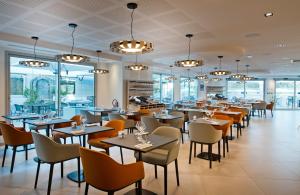 A restaurant or other place to eat at Golden Tulip Sophia Antipolis - Hotel & Spa