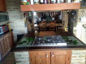 A kitchen or kitchenette at La Toscana