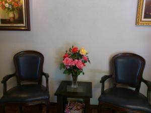 Ein Sitzbereich in der Unterkunft Hotel Peninsular