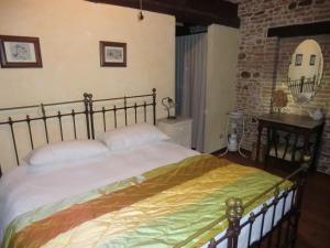 Säng eller sängar i ett rum på Agriturismo Case Mori