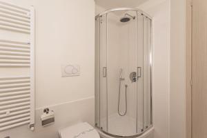 Kúpeľňa v ubytovaní Casa Vermiglio al porto di Genova by Wonderful Italy + 10 fotografií