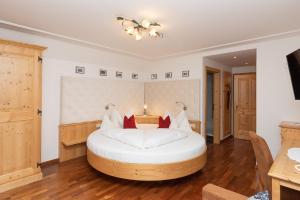 Posteľ alebo postele v izbe v ubytovaní Hotel Zimmerbräu