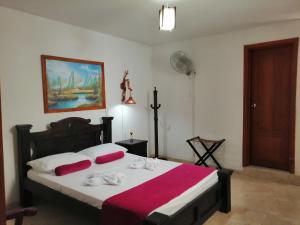 Posteľ alebo postele v izbe v ubytovaní Hotel Agualuna