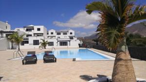 Bazén v ubytování Casa Mykonos 1° linea de mar en Playa Blanca nebo v jeho okolí