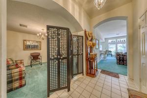 a home with a hallway with a living room at The Trout River House in New Braunfels