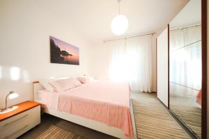 Posteľ alebo postele v izbe v ubytovaní Apartman Antisin
