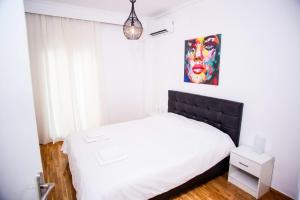 Posteľ alebo postele v izbe v ubytovaní Thessaloniki Center Apartment On The Sea