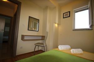 Posteľ alebo postele v izbe v ubytovaní Apartment MEL