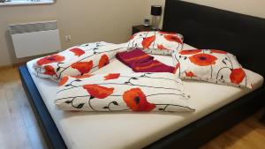 Posteľ alebo postele v izbe v ubytovaní Apartament Maria