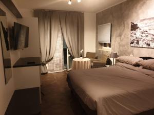 Postel nebo postele na pokoji v ubytování Residenza Carlucci