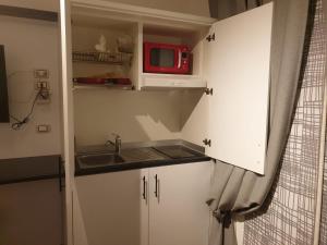 Kuchyň nebo kuchyňský kout v ubytování Residenza Carlucci + 14 fotografií