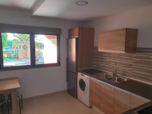 Kuchyňa alebo kuchynka v ubytovaní Edificio Bentejui 1
