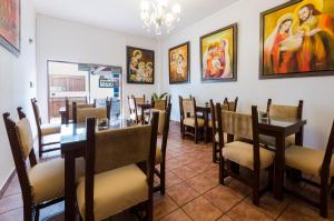 A restaurant or other place to eat at Jose Luis Hostal Boutique
