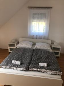 Posteľ alebo postele v izbe v ubytovaní Tihany Levendula Villa