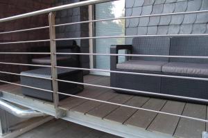 Posezení v ubytování NIZZA CHILLINGHOUSE #1, 3 Min vom ICE, NETFLIX, Balkon
