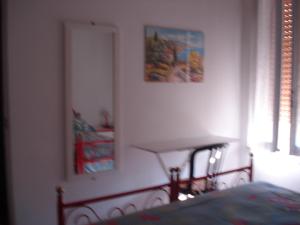 Postel nebo postele na pokoji v ubytování Bed & Breakfast Ciancaleoni