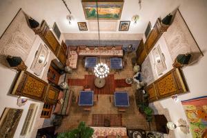 an overhead view of a building with a chandelier at Riad Dar Tahri in Fez