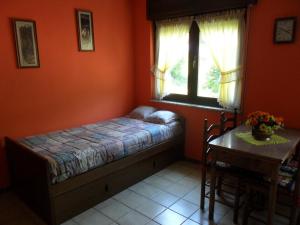 Säng eller sängar i ett rum på Casa Rural La Rectoral De Tuiza