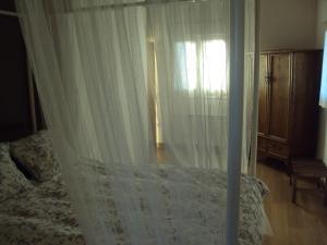 A bed or beds in a room at Casa Los Abetos