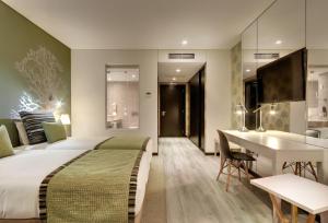 Cama ou camas em um quarto em Hotel Inglaterra - Charme & Boutique