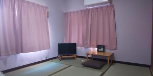 TV at/o entertainment center sa Guest House Fuku-chan