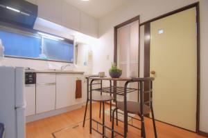 Kuchyň nebo kuchyňský kout v ubytování TOMARIE Residential Suite Edogawa
