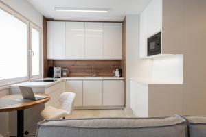 Kuchyňa alebo kuchynka v ubytovaní Apartament Silesian Vip Gliwice