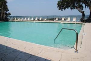 a swimming pool with a swing in the water at Lakeside Inn on Lake Dora in Mount Dora