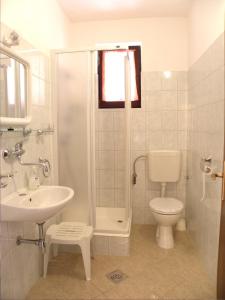 Koupelna v ubytování Apartments Katarina