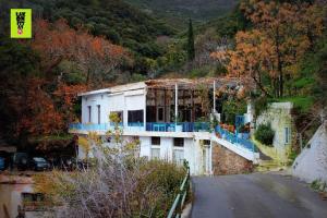 a building on the side of a road at Window To The Aegean in Velanídhia