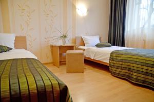 Ένα ή περισσότερα κρεβάτια σε δωμάτιο στο Hotel Sorbona +31 φωτογραφίες