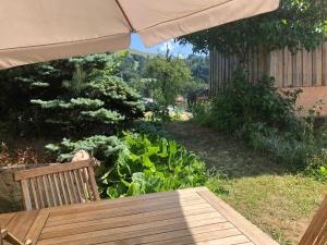 Zahrada ubytování L'ÉPERVIER BLANC
