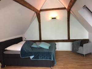 Кровать или кровати в номере Apartment für zwei Personen in romantischem Weindorf