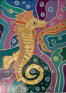 a painting of a gold seahorse at Byala Solita Apartament in Byala