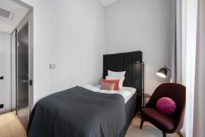 Postel nebo postele na pokoji v ubytování Clarion Hotel Oslo
