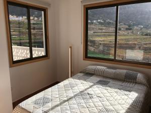 Postel nebo postele na pokoji v ubytování Apartamento amplio y tranquilo con vistas