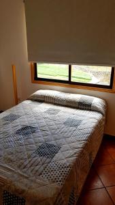 Postel nebo postele na pokoji v ubytování Apartamento amplio y tranquilo con vistas