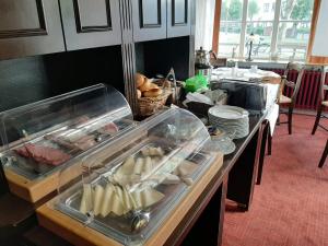 a kitchen with a counter with food on it at Kleine Möwe in Borkum