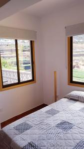 Postel nebo postele na pokoji v ubytování Apartamento amplio y tranquilo con vistas