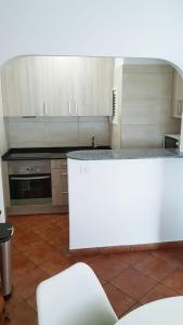 Kuchyň nebo kuchyňský kout v ubytování Apartamento amplio y tranquilo con vistas