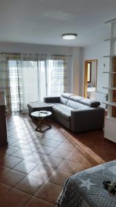 Posezení v ubytování Apartamento amplio y tranquilo con vistas